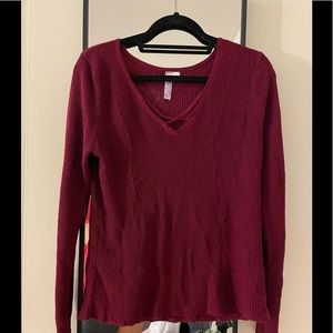 Red sweater cross